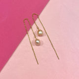 Pearls on a string - peachy